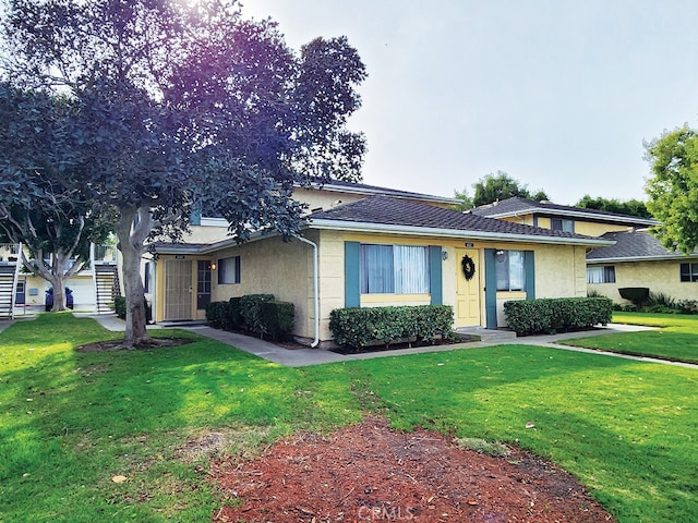 view of front of home with a front yard