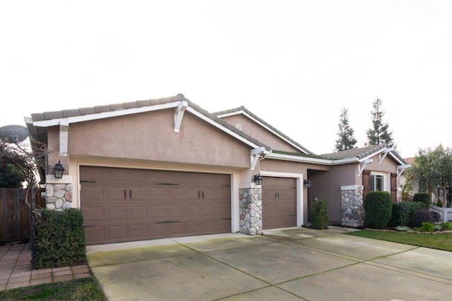 ranch-style home with a garage