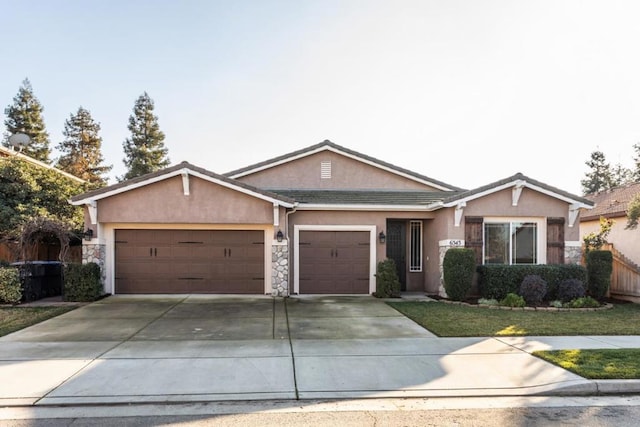 ranch-style house featuring a garage