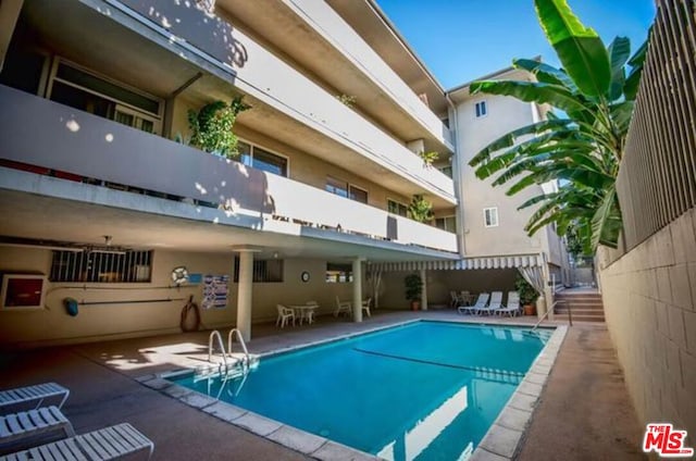 view of pool with a patio area