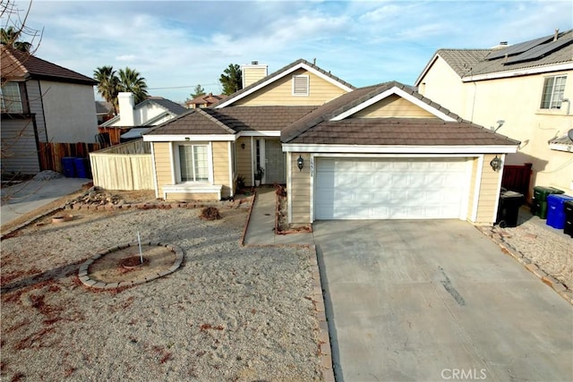 view of front of property featuring a garage