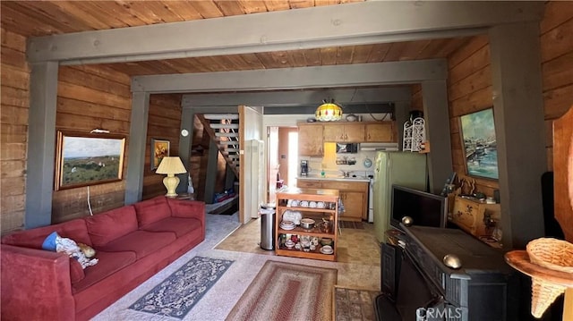 living room featuring wood ceiling, wood walls, and beamed ceiling