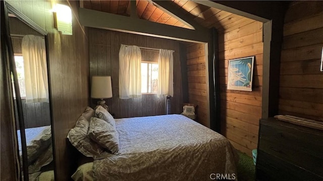 bedroom with vaulted ceiling with beams, wood ceiling, and wood walls