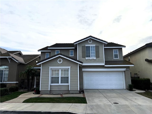 front facade with a garage