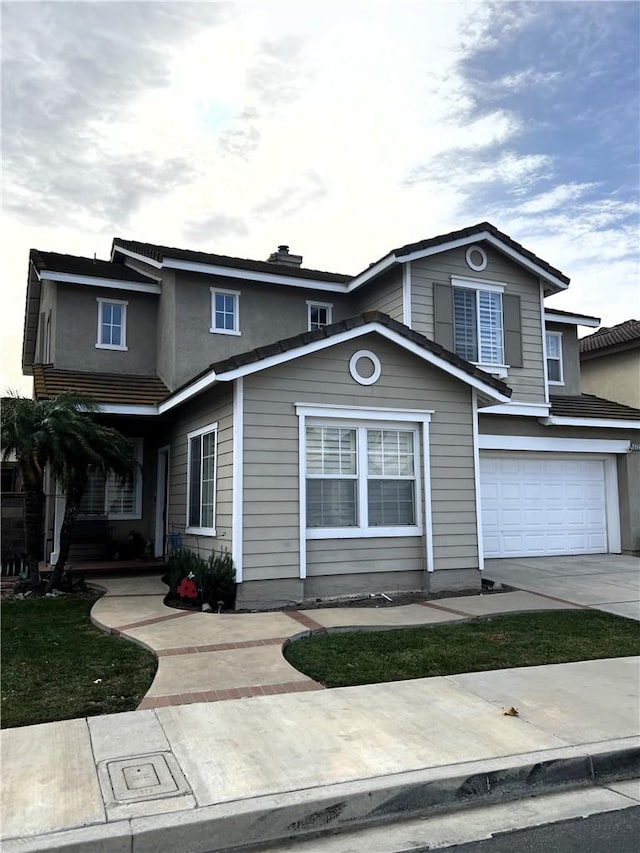 front facade with a garage