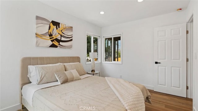 bedroom featuring hardwood / wood-style floors