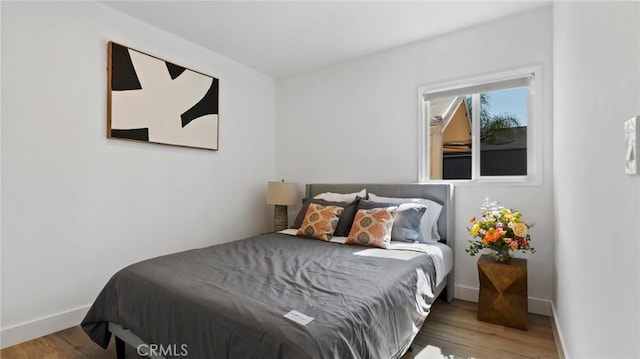 bedroom featuring hardwood / wood-style flooring