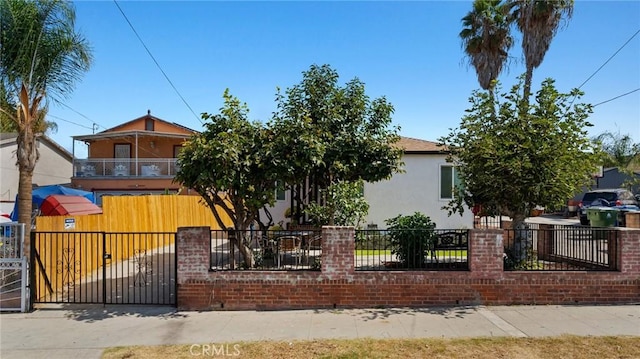 view of front of home with a balcony