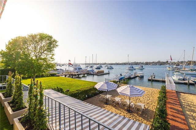 dock area with a water view