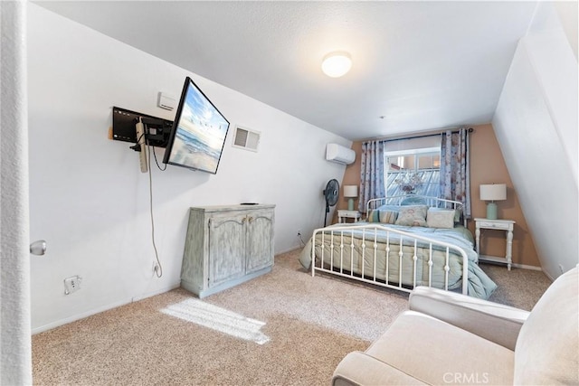 carpeted bedroom featuring a wall unit AC and lofted ceiling