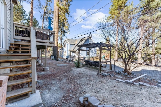 view of yard featuring a pergola and a deck