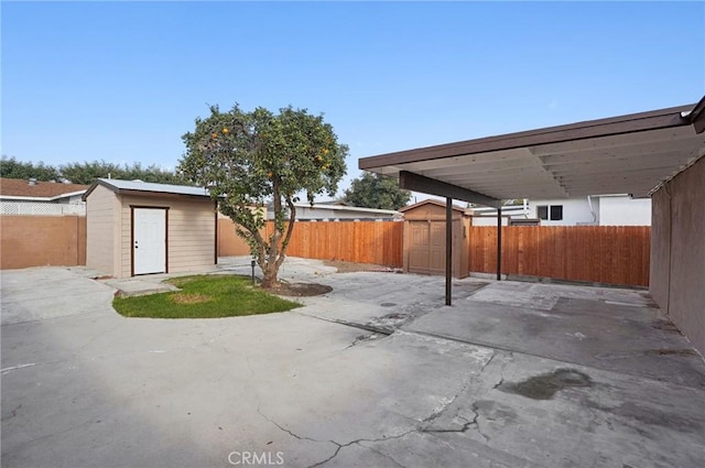 view of patio / terrace with a storage unit