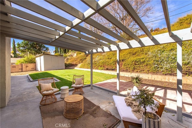 view of patio with a pergola and a shed