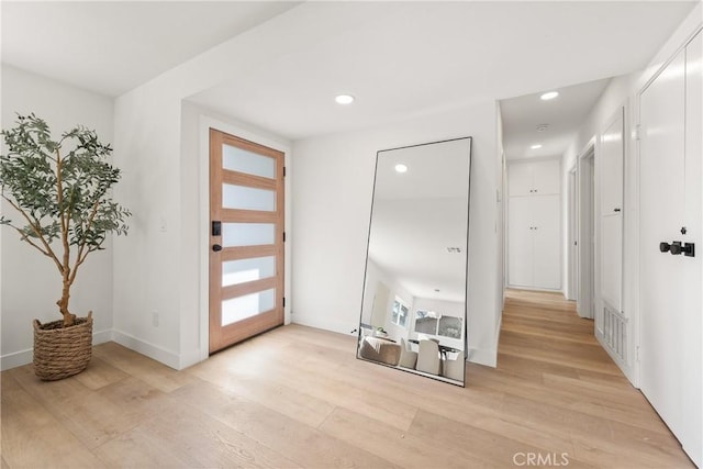 entrance foyer with light hardwood / wood-style floors