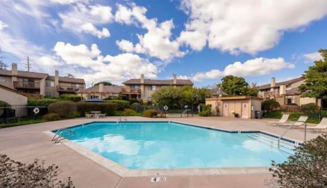 view of swimming pool with a patio