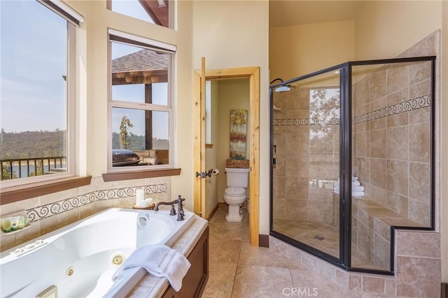 bathroom with toilet, a wealth of natural light, tile patterned floors, and plus walk in shower