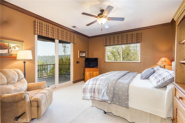 carpeted bedroom with ceiling fan, access to exterior, crown molding, and multiple windows