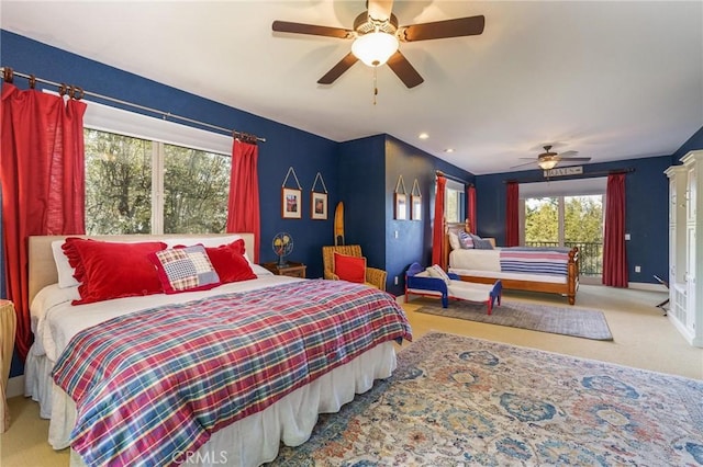 bedroom with ceiling fan and carpet floors