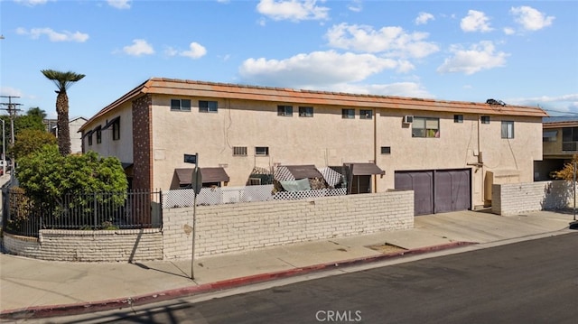 view of property featuring a garage