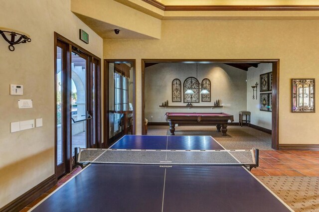 recreation room with crown molding, tile patterned floors, and billiards