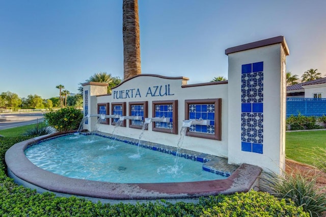 view of pool featuring pool water feature