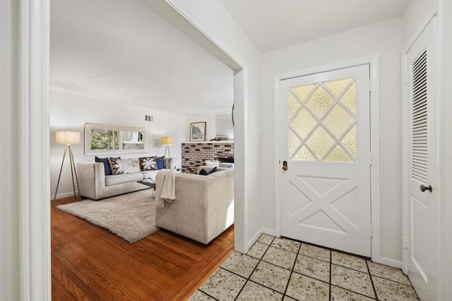 foyer entrance featuring tile patterned floors