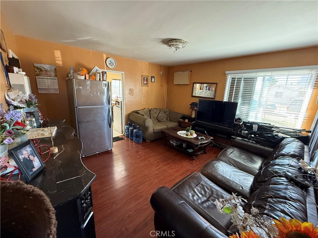 living room with dark wood-type flooring