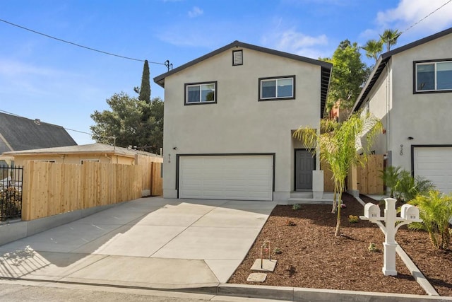 front facade with a garage