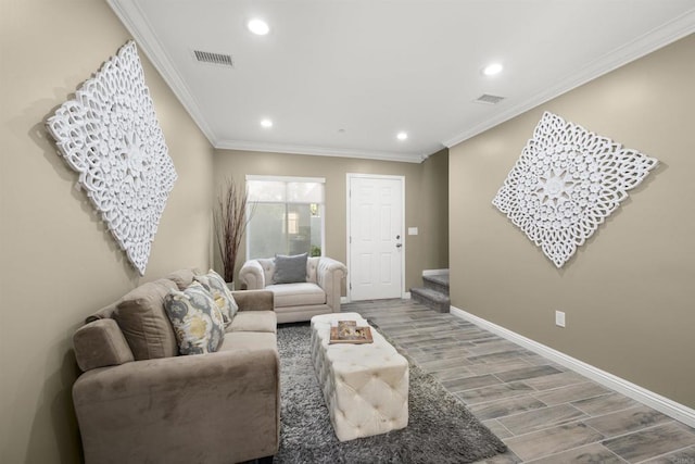 living room with ornamental molding and hardwood / wood-style floors