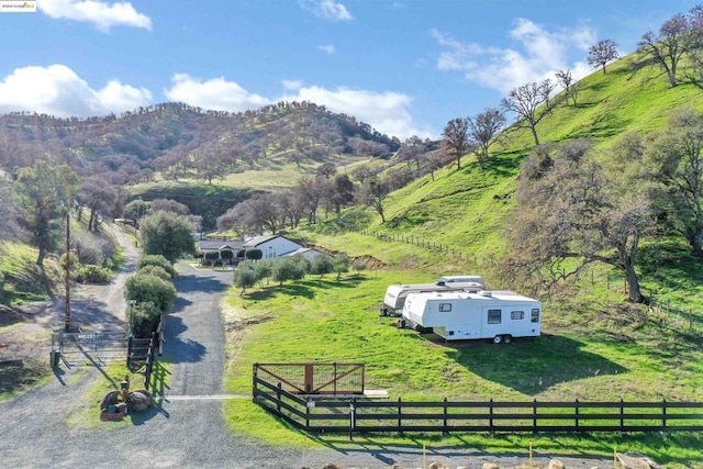 property view of mountains featuring a rural view