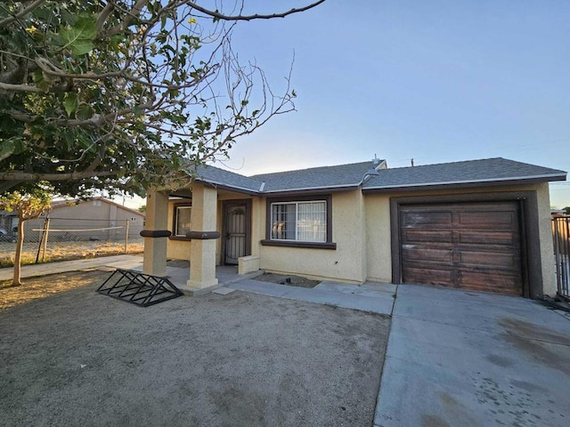 view of front of property featuring a garage