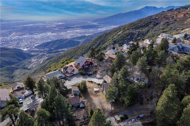 drone / aerial view featuring a mountain view