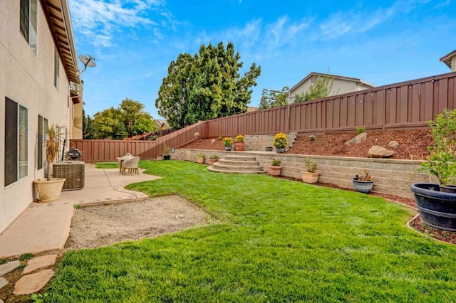 view of yard featuring a patio area and cooling unit