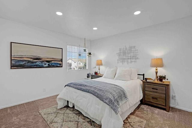 bedroom featuring light colored carpet