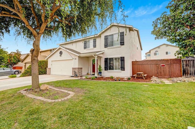 view of front property with a garage and a front lawn