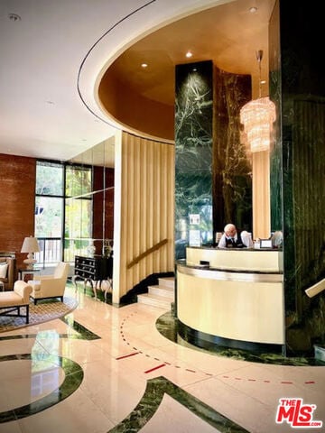 reception area with a notable chandelier