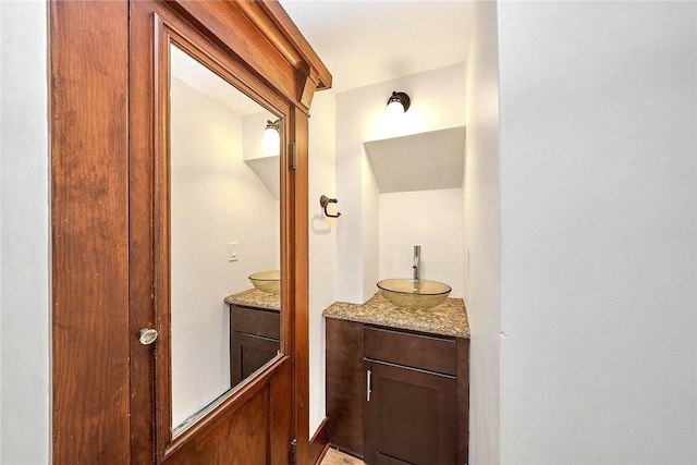 bathroom featuring two vanities