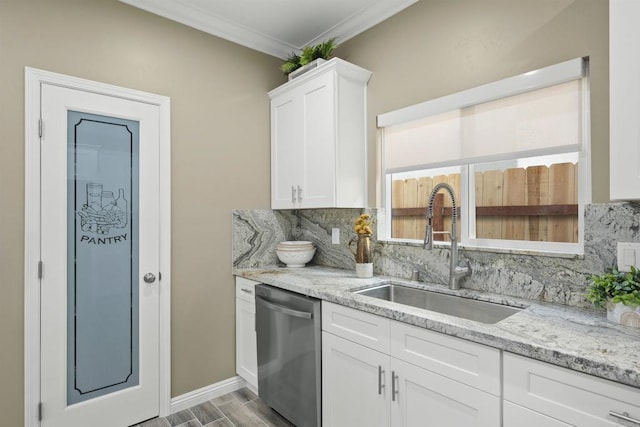 kitchen with white cabinetry, tasteful backsplash, dishwasher, light stone counters, and sink