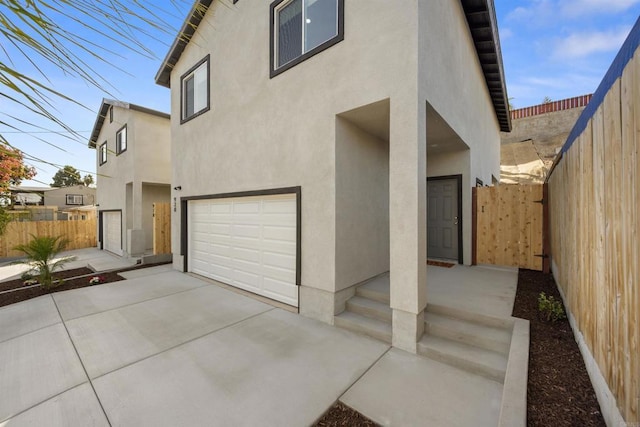 exterior space with a garage