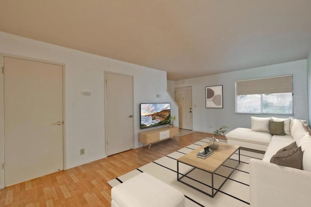 living room with light hardwood / wood-style floors