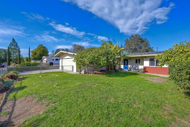 view of yard featuring a garage