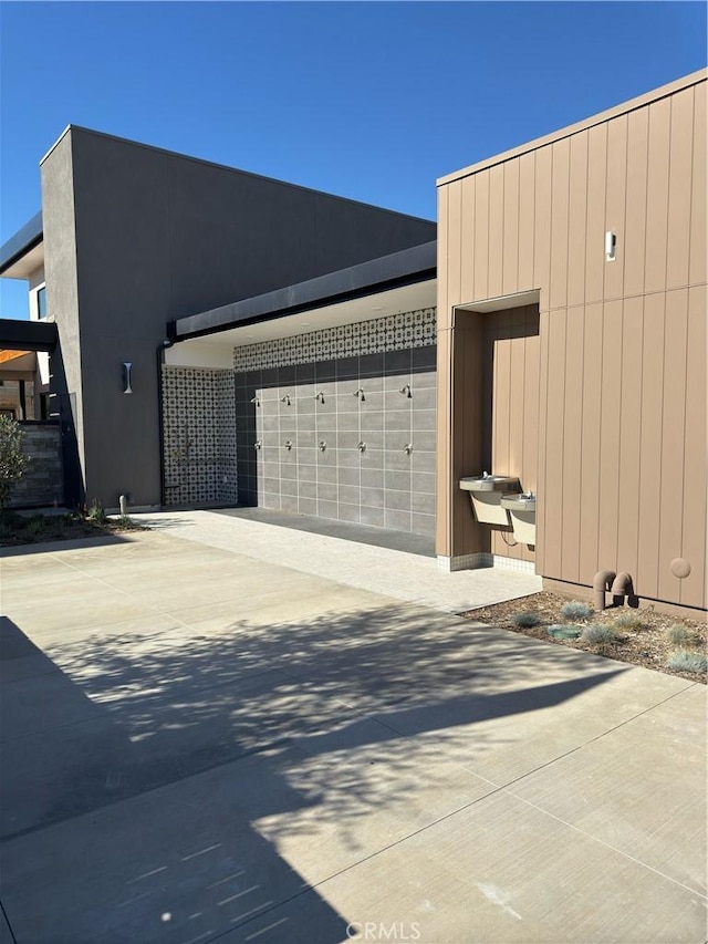 view of side of property featuring a garage