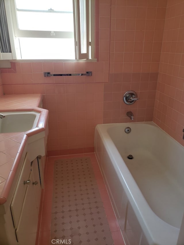 bathroom featuring vanity, shower / bathtub combination, and tile patterned floors