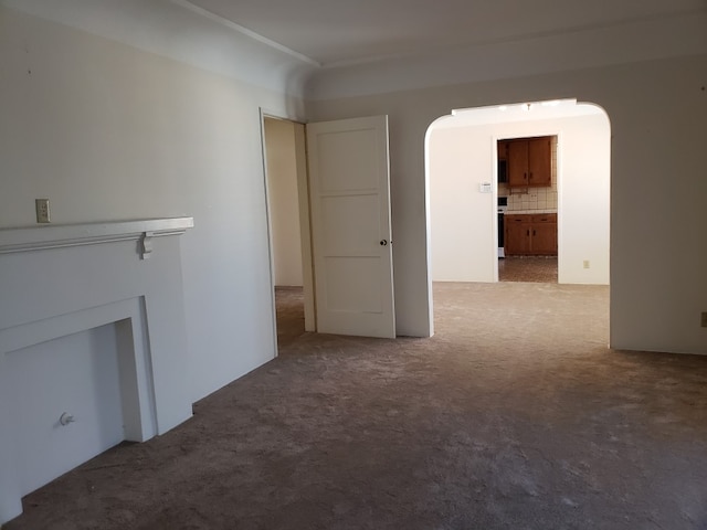 unfurnished living room with carpet