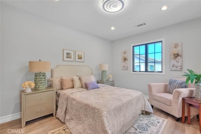 bedroom featuring light hardwood / wood-style flooring