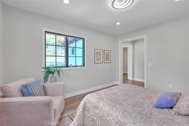 bedroom featuring hardwood / wood-style floors