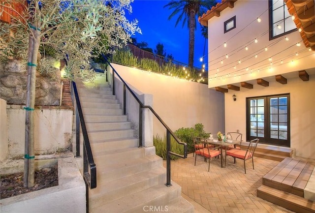 view of patio featuring french doors