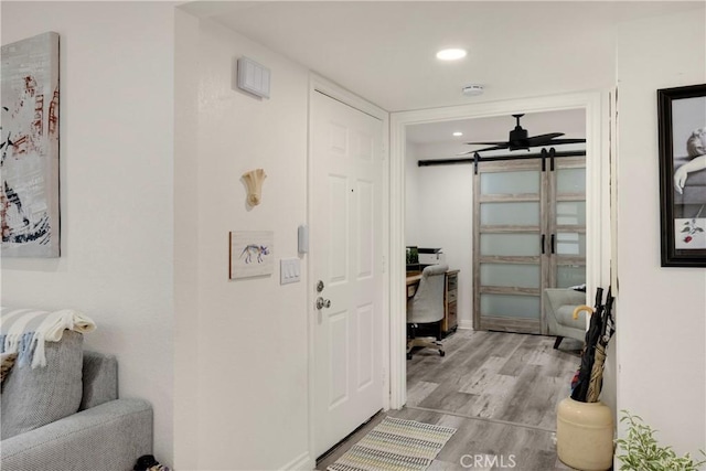 hallway featuring light hardwood / wood-style floors