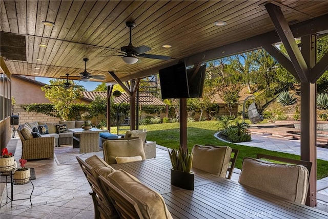 view of patio / terrace featuring an outdoor living space and ceiling fan