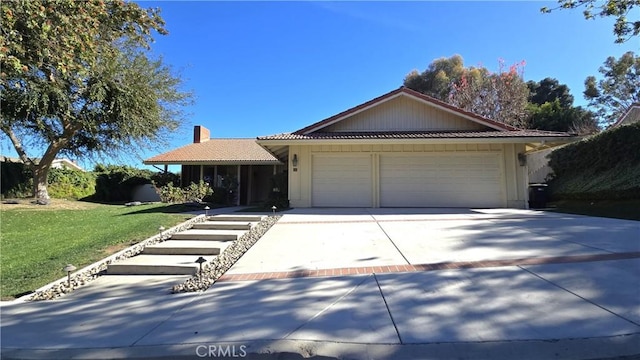 ranch-style house with a front lawn and a garage